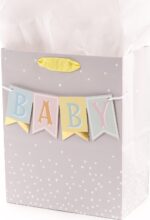 Hallmark medium baby gift bag with a "BABY" banner, foil accents, and a yellow ribbon handle, displayed with white tissue pap