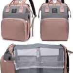 Pink houscly diaper bag backpack with changing station, open to show compartments and accessories.