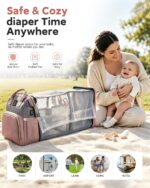 Pink houscly diaper bag backpack with changing station, open to show compartments and accessories.