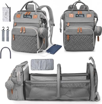 Grey Inclusive LittleOnes diaper bag backpack with a changing station unfolded, showing baby essentials and a pacifier case.