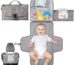Kopi Baby portable diaper changing pad in classic grey, folded with strap, showing wipes pocket and storage.
