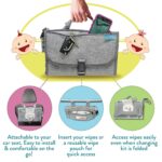 Kopi Baby portable diaper changing pad in classic grey, folded with strap, showing wipes pocket and storage.