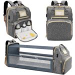 Light grey Lenski diaper bag backpack with a front pocket, showing its spacious design and modern features.