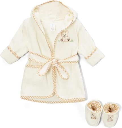 Close-up of a brown Spasilk 100% cotton hooded terry bathrobe with a cartoon pattern and matching booties.