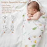A 9-piece khaki new mom and dad gift set with mugs, baby onesie, swaddle blanket, socks, and affirmation cards.