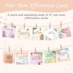 A 9-piece khaki new mom and dad gift set with mugs, baby onesie, swaddle blanket, socks, and affirmation cards.