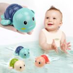 Three colorful TOHIBEE wind-up turtle bath toys, blue, green, and red, floating in water, designed for toddlers.