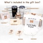 A WITOROR 13-piece baby shower gift set for new parents, featuring bear-themed baby clothes and parent cups.