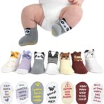 Seven pairs of ZIRI & ZANE baby socks in various multi-color, animal print, letter print, and striped patterns.