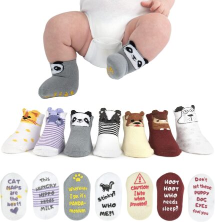 Seven pairs of ZIRI & ZANE baby socks in various multi-color, animal print, letter print, and striped patterns.