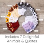 Seven pairs of ZIRI & ZANE baby socks in various multi-color, animal print, letter print, and striped patterns.